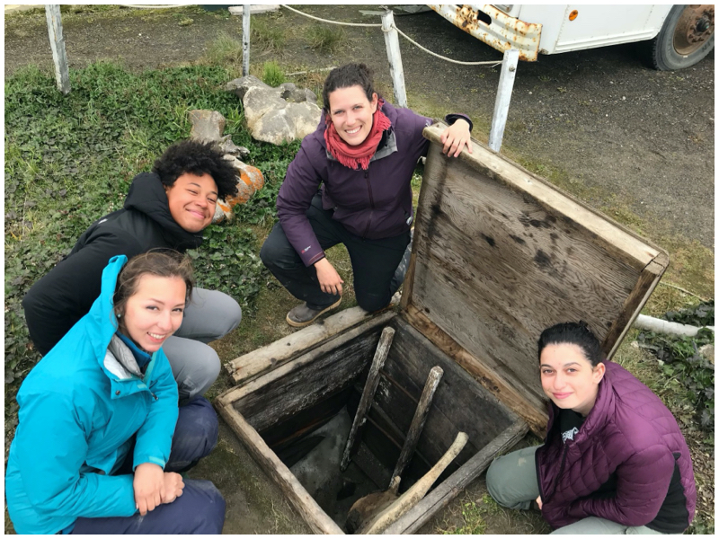 Students inspecting an ice cellar