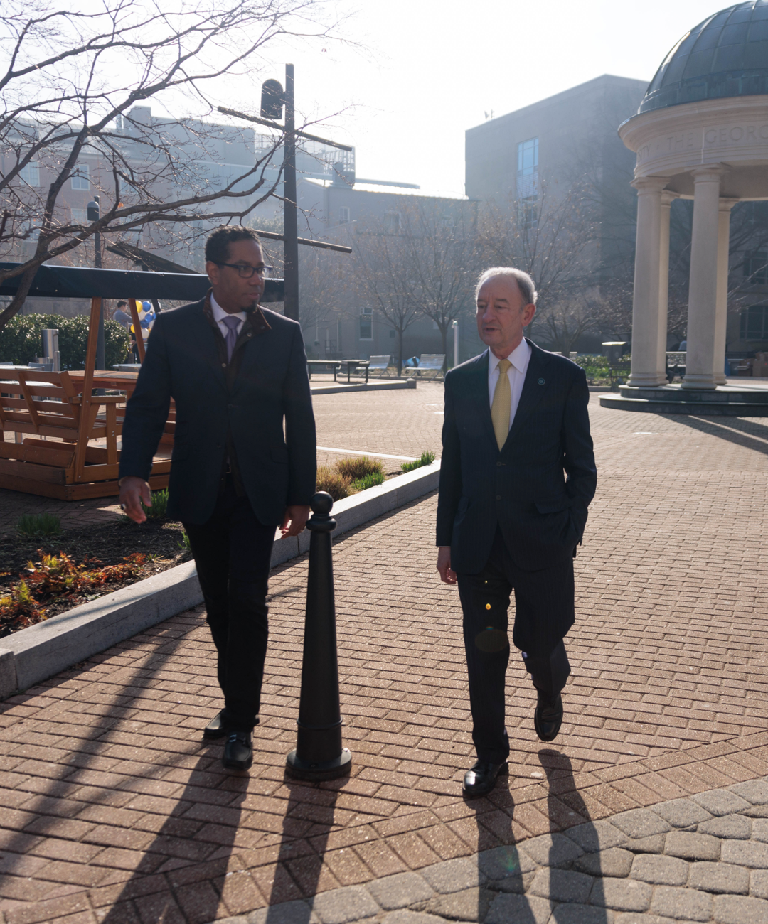 Bracey and President Wrighton walk through Kogan Plaza on an early spring day.