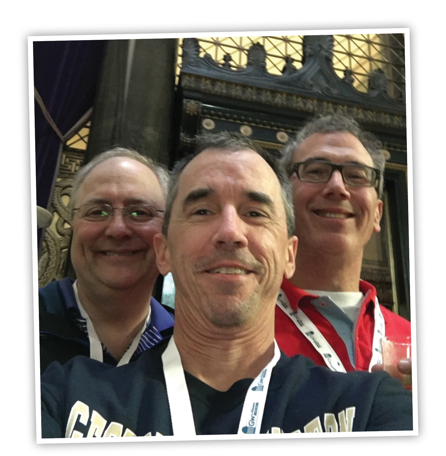 Peter Morin, B.A. ’81; Kevin Crilly, B.A. ’81; and Leon Rosenman, B.B.A. ’81, in front of Thurston Hall at their 35th reunion in October 2016. 