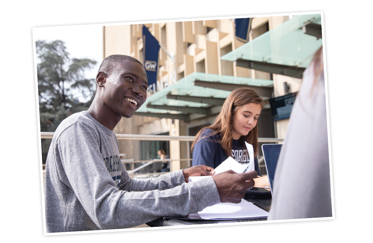 Students studying on GW Campus
