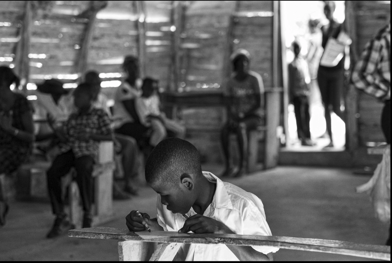 black and white photo of little boy