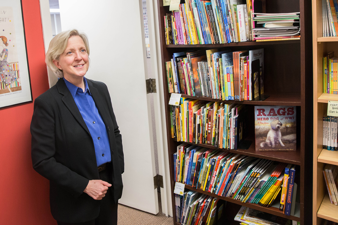 person standing in library
