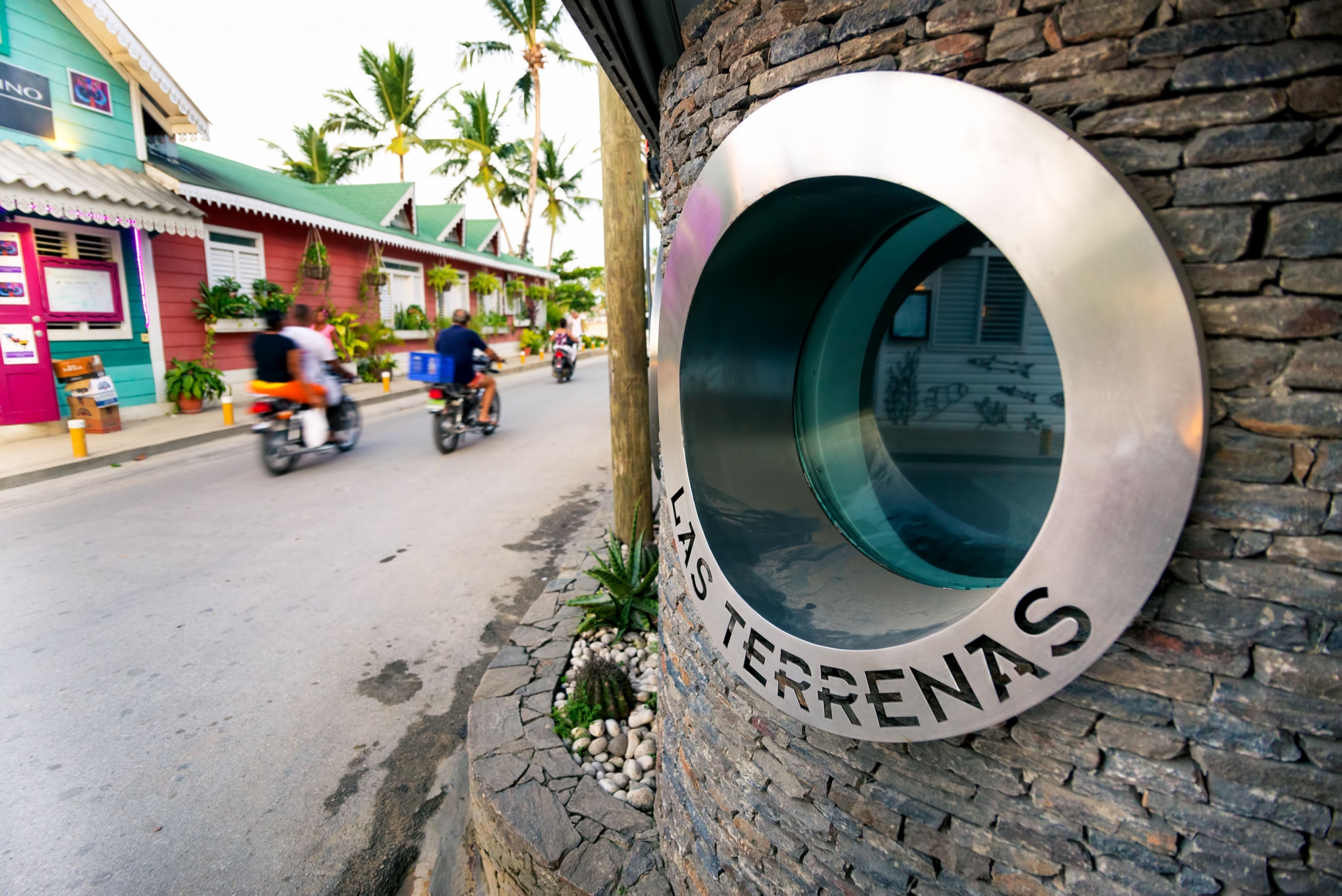 Motorcyclists ride down a street in Las Terrenas, a coastal in the Dominican Republic.  (iStock)
