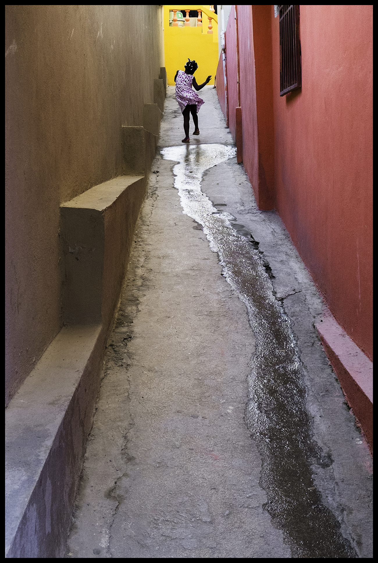 Girl dancing in alley