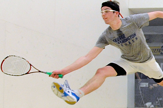 student playing tennis