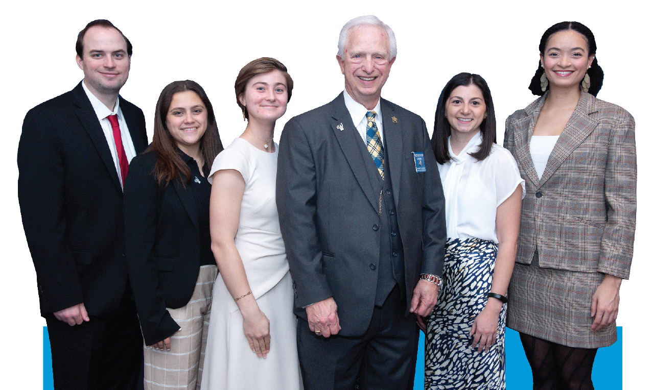 Students Robert Reasoner, Amanda Krantz, Maren E. Nicolaysen, Ashley Alessandra and Brianna Gist with Wolcott Foundation Chair Michael Clark (center), whose foundation assists master's students seeking a career in government service.
