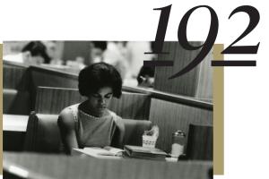 192, A student reading at a table