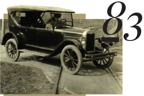 83, Fred Moss driving an old car