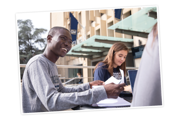 Students studying on GW Campus