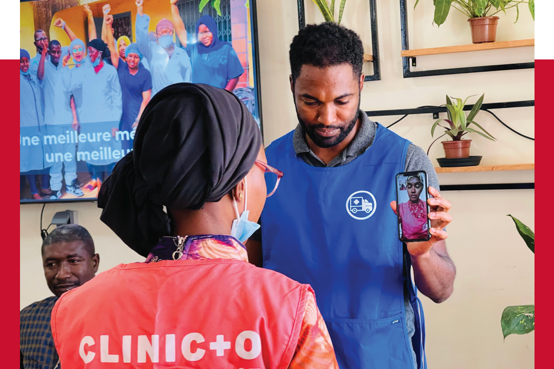 Nasser holding telemedicine apt on phone