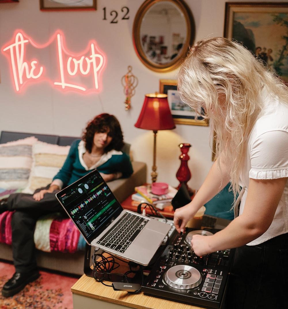 Two students spend time in The Loop clothing exchange store